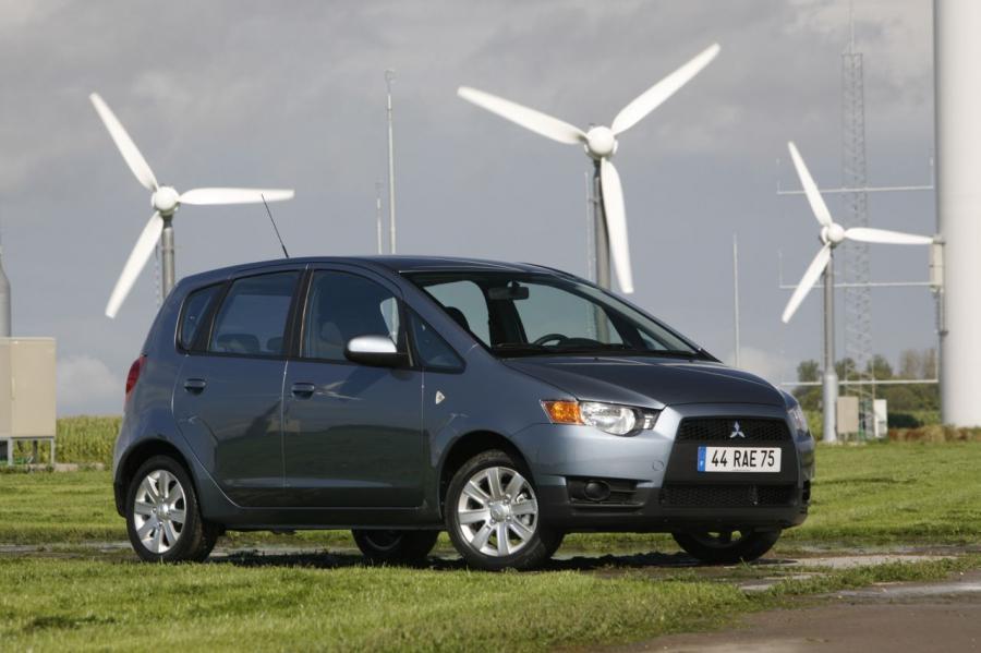  Mitsubishi Colt 2009 года  (фото 32 из 36)
